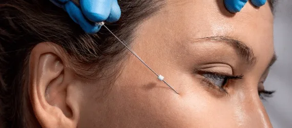 Mask-Group-18 Woman getting her face injected